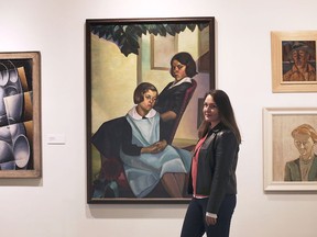 Look Again! Outside! A replica of these two Sisters of Rural Quebec will soon be going up in downtown Windsor. Jennifer Matotek, executive director of the Art Gallery of Windsor, is shown on Wednesday, Oct. 7, 2020, next to the original painting by Prudence Heward.