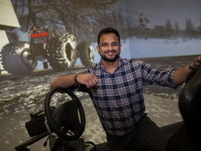 Akash Charuvila, the Virtual Reality CAVE (Cave Automatic Virtual Environment) operator at the Institute for Border Logistics and Security, is pictured in the CAVE, Tuesday, Oct. 13, 2020. The CAVE will be used in the development of a new Canadian concept vehicle.
