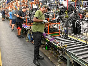 FILE PHOTO: Engines assembled as they make their way through the assembly line at the General Motors (GM) manufacturing plant in Spring Hill, Tennessee, U.S. August 22, 2019.
