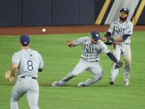 Tampa Bay Rays centre fielder Kevin Kiermaier and Tampa Bay Rays right fielder Manuel Margot collide while attempting to catch the fly ball hit for a double by Los Angeles Dodgers third baseman Justin Turner, not pictured, in the 8th inning in game two of the 2020 World Series at Globe Life Field.