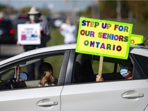 Participants in the Ontario Health Coalition's Day of Action on Long-Term Care rallied outside Heron Terrace in Tecumseh on Thursday, Oct. 8, 2020. The demonstration was held in part to call for action by the Ford government to recruit and train more staff and improve pay and working conditions for staff.