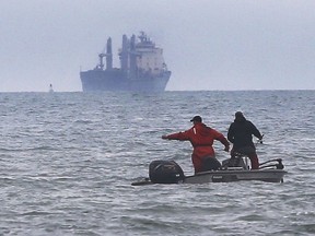 WINDSOR, ON. OCTOBER 22, 2020 -  A couple of anglers are shown near Peche Island on Thursday, October 22, 2020, on an overcast gray day.
