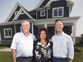 The In Honour of the Ones We Love organization held a gala in Belle River last year to celebrate a huge donation to the charity. B.K. Cornerstone Design/Build constructed a brand new home and recently donated the complete sale proceeds to the organization. Anita Imperioli, founder of the organization poses with Ben Klundert, left, and Brent Klundert of B.K. Cornerstone Design/Build in front of the home on July 26, 2019.