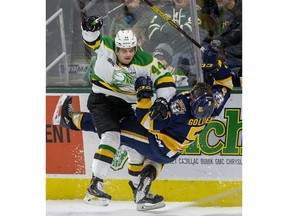 London Knights player Jonathan Gruden levels Jacob Golden of the Erie Otters during first- period play at Budweiser Gardens on Nov. 1, 2019. (Derek Ruttan/The London Free Press)