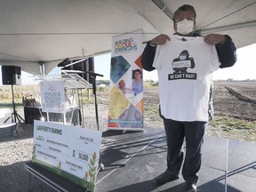 David Musyj, president and CEO of Windsor Regional Hospital displays a "We Can't Wait" gorilla themed t-shirt during a press conference on Friday, October 16, 2020. The shirt was in reference to Ontario Premier Doug Ford's recent comment that he will fight like a 800 pound gorilla for a new hospital for the region.