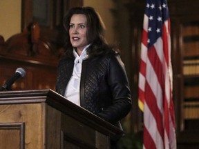 Michigan Governor Gretchen Whitmer speaks during a news conference after thirteen people, including seven men associated with the Wolverine Watchmen militia group, were arrested for alleged plots to take Whitmer hostage and attack the state capitol building, in Lansing, Michigan, U.S., October 8, 2020.