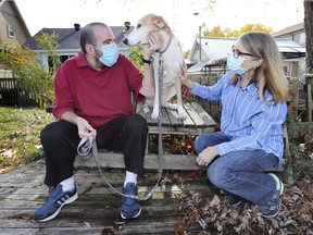 Tom Taylor is shown with his mother Linda Taylor and the family dog Penny at her Lakeshore home on Tuesday, October 20, 2020. Tom lives in a congregate care setting home in Windsor and was not able to visit his mother for months due to pandemic protocols.