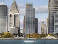 A sailboat cruises past downtown Detroit, Wednesday, October 21, 2020. Americans go to the polls on Nov. 3.