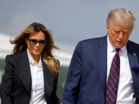 U.S. President Donald Trump and first lady Melania Trump board Air Force One as they depart Washington on campaign travel to participate in the first presidential debate with Democratic presidential nominee Joe Biden in Cleveland, Ohio at Joint Base Andrews, Maryland, U.S., September 29, 2020.