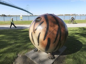 Not just a toothless tiger but now a headless one too. The remains of this riverfront sculpture near the Ambassador Bridge, shown Monday, Oct. 5, 2020, are facing removal due to vandalism.