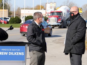 City of Windsor's Mark Winterton and Mayor Drew Dilkens discuss the next phase of infrastructure expenditures on Provincial Road Monday.