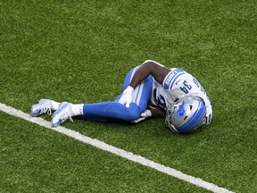 Tony McRae of the Detroit Lions lies on the ground injured during the second quarter of their game against the Minnesota Vikings at U.S. Bank Stadium on November 08, 2020 in Minneapolis, Minnesota.