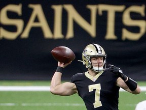 Taysom Hill of the New Orleans Saints passes the ball in the second quarter against the Atlanta Falcons at Mercedes-Benz Superdome on November 22, 2020 in New Orleans, Louisiana.