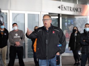 Unifor Local 444 president Dave Cassidy and other labour leaders along with MP Brian Masse discuss single sport betting possibilities at Caesars Windsor Wednesday.