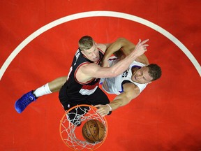 Blake Griffin of the Los Angeles Clippers slam dunks against Mason Plumlee of the Portland Trail Blazers during the first half in Game One of the Western Conference Quarterfinals during the 2016 NBA Playoffs at Staples Center April 17, 2016, in Los Angeles, California.