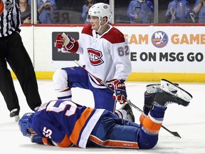 Johnny Boychuk of the New York Islanders is injured during a game against the Montreal Canadiens at the Barclays Center on March 3, 2020 in New York.