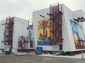 Murals by local Indigenous artists are shown on the tower crane climbing systems at the Gordie Howe International Bridge construction site on Friday, November 27, 2020.