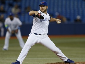 Blue Jays pitcher Mark Buehrle with a delivery in the fourth inning of a Jays game at the Rogers Centre in Toronto, May 7, 2014.