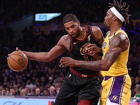 Cleveland Cavaliers centre Tristan Thompson (13) dribbles to the basket on Los Angeles Lakers defender Dwight Howard at Staples Center.