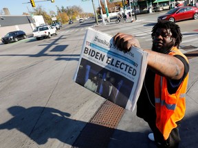 David Woods sells the Sunday Detroit Free Press on Livernois and Seven Mile Road announcing that Joe Biden has been declared President-elect on November 8, 2020 in Detroit, Michigan. - One of the most prominent Republicans in the US Congress on Sunday urged Donald Trump to "fight hard" and not concede his loss to Joe Biden in the race for the White House, saying unfounded allegations of fraud by the president must be investigated. Other Republicans sought to walk a finer line, saying legal challenges must be allowed to play out."We will work with Biden if he wins, but Trump has not lost," Senator Lindsey Graham of South Carolina said on Fox News.