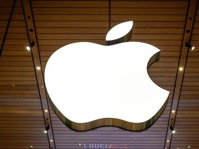 The Apple logo is seen at a company store in an upscale shopping mall in Bangkok on November 10, 2020.
