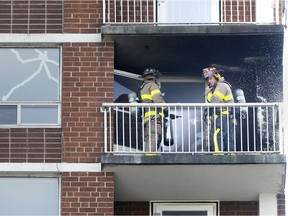 Windsor firefighters put out a fire on a balcony at the Raymond Desmarais Manor in downtown Windsor on Friday, Nov. 20, 2020. The 200 block of Riverside Drive was closed for about half an hour during the incident. No injuries were reported and the fire was contained to the balcony.
