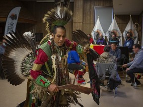 A traditional First Nations dance is performed at the announcement that 201 acres of land has been confirmed for the start of a Caldwell First Nations reserve, Monday, Nov. 23, 2020.