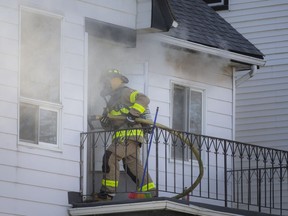 Fire crews battle a fire at a 9-unit residential dwelling at 533 Church St. in downtown Windsor, Thursday, Nov. 12, 2020.  No injuries were reported.