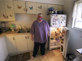 "It's a very tough world out there right now." Christi Chauvin is shown at her Windsor home on Thursday, Nov. 26, 2020. Unemployed and struggling to pay her bills on limited income, Chauvin is one of the growing number of Windsorites who have turned to local food banks for help.