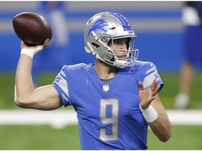 Detroit Lions quarterback Matthew Stafford passes the ball during the fourth quarter against the Washington Football Team at Ford Field.