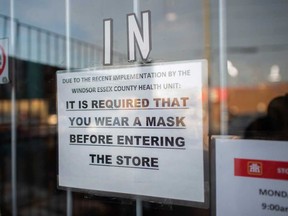 A sign at the entrance of the Home Hardware store on Seminole Street in Windsor notifies customers of indoor masking requirements. Photographed Nov. 20, 2020.
