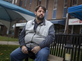 WINDSOR, ONT:. NOVEMBER 5, 2020 - Reverend Ron Dunn, executive director of the Downtown Mission, sits on a bench where he'll be for 24 hours raising funds for the homeless shelter, Thursday, Nov. 5, 2020.