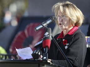 Theresa Charbonneau, mother of the late Cpl. Andrew Grenon of Windsor, recites a poem at the Remembrance Day ceremony in downtown Windsor on Nov. 11, 2020.