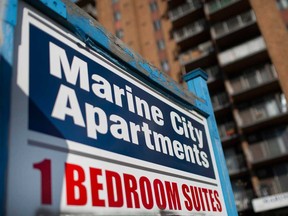 A sign in front of the Marine City Apartments building on Ouellette Avenue in Windsor on Nov. 16, 2020.