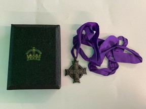 Photos from an Ebay listing show the Canadian Memorial Cross medal that was awarded to the family of Pte. G. A. Dixon. Full name: George Alfred Dixon