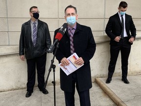 From left to right Kevin Cosgrove, Brian Masse, and University of Windsor student Connor Cosgrove discuss the rise in fraudulent calls in Canada.