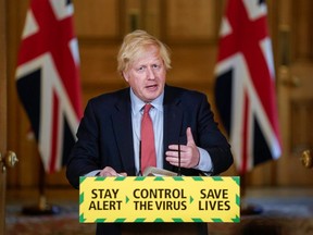 Britain's Prime Minister Boris Johnson, photographed during his daily news conference at 10 Downing Street on May 25, 2020, has been allowed to take exercise in the grounds of Buckingham Place.