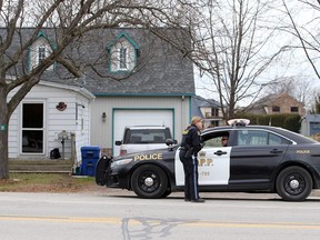 OPP officers remain at a residence in the 200 block of Puce Road in Lakeshore following an assault incident on Dec. 7, 2020.