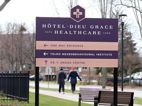 Health-care workers head out for a walk at Hotel-Dieu Grace Healthcare on Prince Road Tuesday.