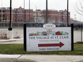 Road sign showing entrance to Schlegel Villages' The Village at St. Clair is shown Dec. 21, 2020.