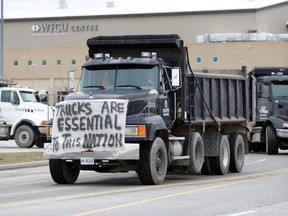 A dump truck participating in a protest convoy that started at the WFCU Centre in Windsor on Dec. 28, 2020.