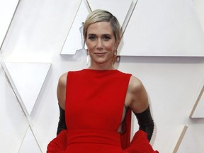 Kristen Wiig poses on the red carpet during the Oscars arrivals at the 92nd Academy Awards in Hollywood, Calif., Feb. 9, 2020.