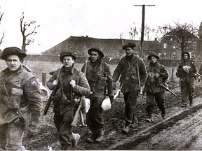 Members of the Argylls Regiment, which included Windsor's Pte. Clarence Richard Vaise, march forward to Veen, on March 6, 1945. Pte. Clarence Richard Vaise was killed in action the next day.