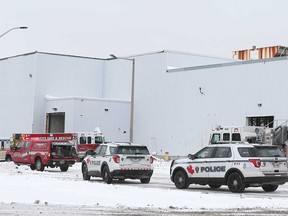 Windsor police and firefighters at the scene of a fatal industrial accident in the 6500 block of Cantelon Drive in the city's east end on Dec. 26, 2020.