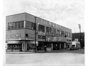 The Capitol Theatre is shown in 1949. Minden's Gifts and Coutts Drugs operated in the same building as the Capitol at the time. The Provincial Bank of Canada, now a parking lot, can be seen at the right. An unidentified restaurant, now the site of Phog Lounge, sits in between.