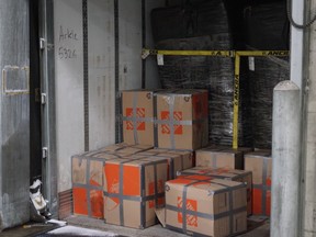 Boxes of marijuana hidden amongst a load of peat moss in a truck entering the U.S via the Ambassador Bridge are shown in this provided photo.