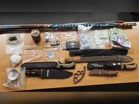 Cocaine, hashish, fentanyl, and a prohibited weapon seized by Essex County OPP after raids on two locations in Leamington on Dec. 18, 2020.