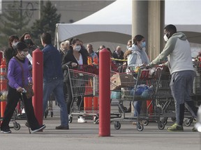 With a lockdown announced on Friday, Dec. 11, 2020, for Windsor-Essex and set to begin Monday, shoppers began flocking to local stores and businesses Friday afternoon. Here, the lineup formed outside Windsor's Costco outlet.