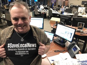 Mark Stewart, night news editor at the Windsor Star, is pictured in the Windsor Star newsroom in January 2020. Stewart, 58, died suddenly on Wednesday, Dec. 9, 2020.