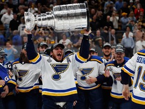 Blues left wing Alexander Steen hoists the Stanley Cup after defeating the Bruins in game seven of the 2019 Stanley Cup Final at TD Garden in Boston on June 12, 2019.